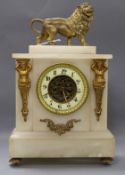 An alabaster mantel clock with gilt metal lion surmount height 37cm