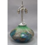 A 1940's art glass lamp base, of squat bulbous form, having opaque marble-effect decoration in blue,