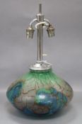 A 1940's art glass lamp base, of squat bulbous form, having opaque marble-effect decoration in blue,