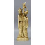 A Japanese walrus ivory figure of an immortal height 17cm