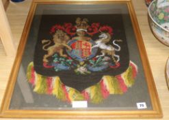 An armorial beadwork Berlin firescreen 52 x 40cm