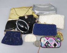 A collection of evening bags and two bakelite necessaires