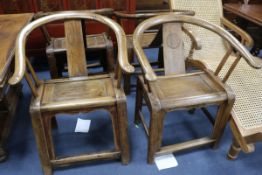 A set of four Chinese horseshoe shaped chairs