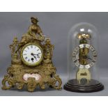 A Hermle, West Germany brass skeleton mantel clock under glass dome and a spelter figural mantel