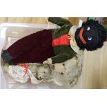 A vintage musical Golly soft toy and two early 20th century Steiff-style blond mohair bears, the
