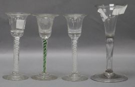 A 19th/20th century pair of twist glasses and one other tallest 18cm