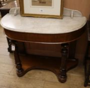 A Victorian marble top mahogany washstand W.106cm