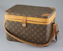 A Louis Vuitton vanity case with tan leather shoulder strap length 33cm