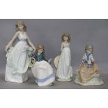 A Lladro figure of a girl with a hat and three small Nao figures of girls tallest 27cm (4)