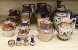 A collection of Doulton Lambeth and Royal Doulton stoneware, including a 'Gladstone' jug (repaired),