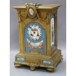 A French ormolu mantel clock with Sevres-style panels height 34.5cm