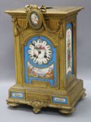 A French ormolu mantel clock with Sevres-style panels height 34.5cm