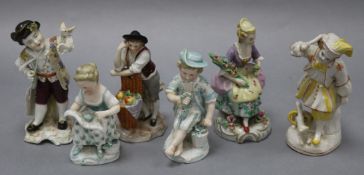 A pair of figurines and four others tallest 13cm