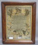 A framed sampler "1828" 44 x 31cm