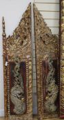 A pair of Thai polychrome and gilt 'dragon' panels each panel width 36cm height 52cm