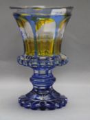 A 19th century Bohemian blue and amber flash cut goblet