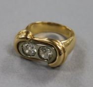 A heavy gold and diamond dress ring, set two brilliant cut stones, each approximately 0.75cts,