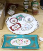 A collection of Limoges and other decorative porcelain, including a shaped circular two-handled tray