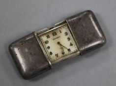 A late 1920's silver Movado travelling watch, 47mm.