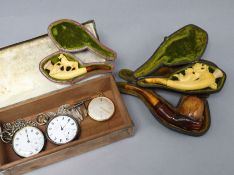 Three cased Meerschaum pipes, three assorted pocket watches and sundries