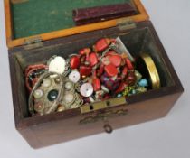 A tea caddy containing mixed costume jewellery and a amber cigar holder etc