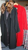 A 1930s black wool coat and an American red velvet duster coat