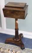 A Victorian rosewood teapoy, the top with secret compartment W.39cm