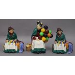 Three Royal Doulton figures: two Silks and Ribbons HN2017 and Old Balloon Seller HN1315