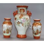 A Japanese Kutani vase and a smaller pair of vases tallest 30cm