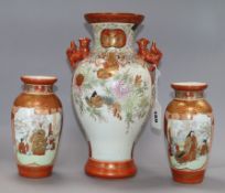 A Japanese Kutani vase and a smaller pair of vases tallest 30cm