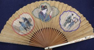 A Japanese painted silk leaf fan,Meiji period, with gilt lacquered ivory guards