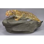 A Royal Doulton Leopard on Rock, HN2638 length 40cm