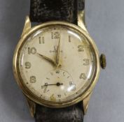 A gentleman's early 1940's 9ct gold Omega manual wind wrist watch.