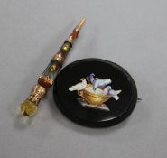 A micromosaic oval "Pliny Doves" brooch and a yellow metal and Scottish hardstone dirk brooch.