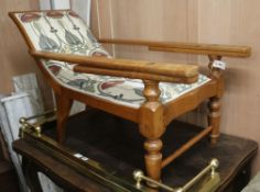 A teak planter chair with Art Nouveau style upholstery W.63cm