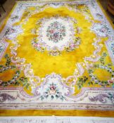 A Chinese gold ground medallion carpet 375 x 275cm