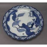 An Arita blue and white dish c.1680/1720, with egrets below a willow tree diameter 35cm