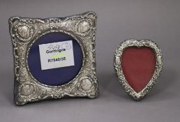 Two small silver mounted photograph frames, one heart shaped.