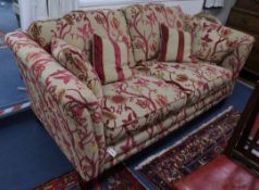 An upholstered deep seated two seater settee W.200cm