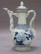 A 19th century Chinese blue and white ewer and cover height 25cm