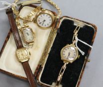 A lady's' 9ct gold wrist watch on expanding bracelet and three other lady's watches.