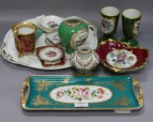 A collection of Limoges and other decorative porcelain, including a shaped circular two-handled tray