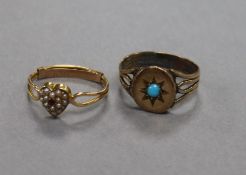 Two antique yellow metal gem set rings, including heart shape with seed pearls.