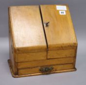 An oak stationery box height 30cm