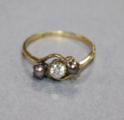 A yellow metal diamond and Tahitian cultured pearl three stone ring, size O.