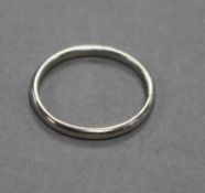 A platinum wedding band, size R.