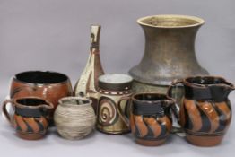 A collection of studio pottery by Derek Emms, Robert Fournier and others, to include a graduated set
