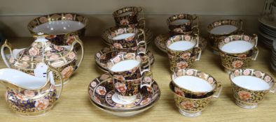 A twenty eight piece London shape part tea set and a small quantity of Indian Tree