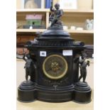 A slate clock mantel clock mounted with cherubs height 47cm