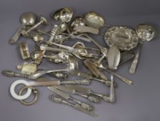 A quantity of mainly sterling silver items including flatware, napkin rings etc, weighable silver 27